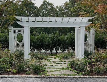 Pergola_with_lattice_and_oval_window.jpeg