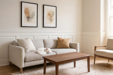 Elite Raised Panel Wainscoting installed in a modern living room, showcasing crisp MDF panels, detailed rails, and a tall wood cap for a classic architectural look.