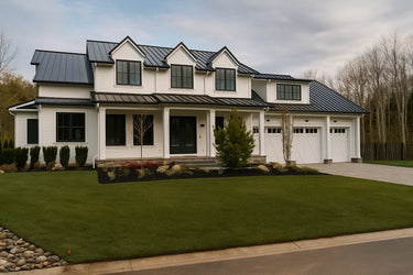 Beautiful modern farmhouse with square pultruded fiberglass columns in America. These sleek, durable fiberglass columns provide lasting strength and timeless curb appeal for residential designs. Shop now at Elite Trimworks.
