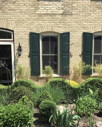 exterior raised panel shutters with arched top.jpg