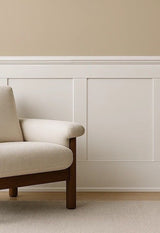 Primed MDF Flat Wainscoting Kit installed on an interior wall, emphasizing clean architectural lines and matching base and cap trim.