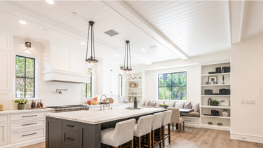Modern white kitchen with recessed paint-grade MDF wood ceiling beams and beadboard panels.